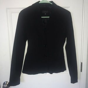 The limited black stretchy blazer size 4